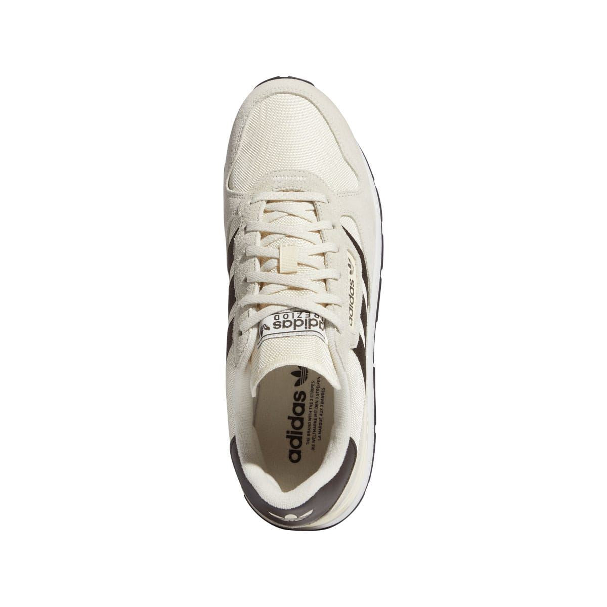 Off-white lace-up adidas Trezoid 2.0 trainer showing toe cap and padded collar