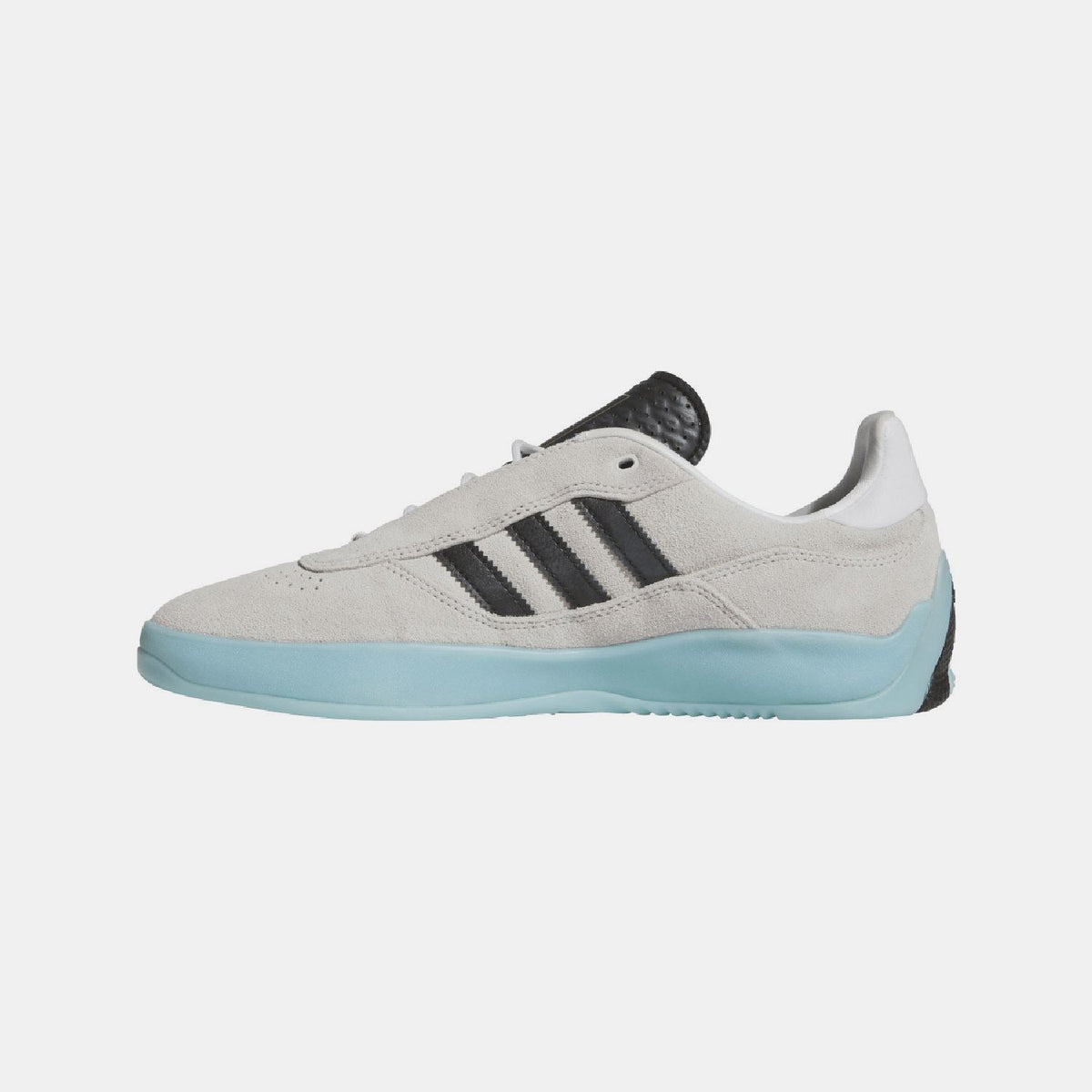 White suede trainers with black adidas stripes and light blue platform outsole.