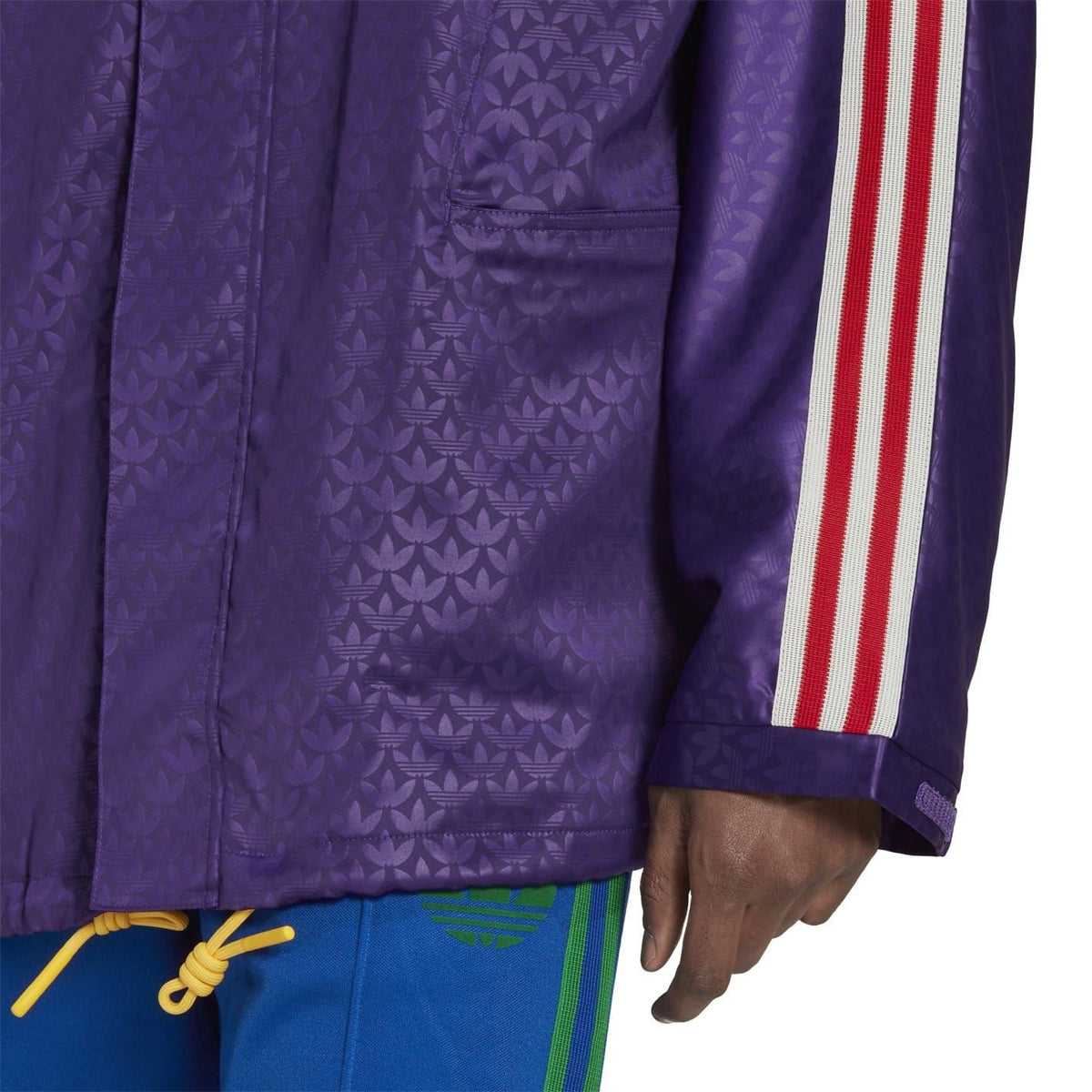 adidas Originals hooded relaxed fit windbreaker jacket displayed, lightweight coat with adjustable hood and sporty style