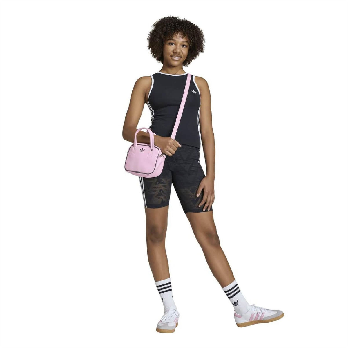 Juniors’ black geometric print athletic shorts with slim fit and contrast side stripes