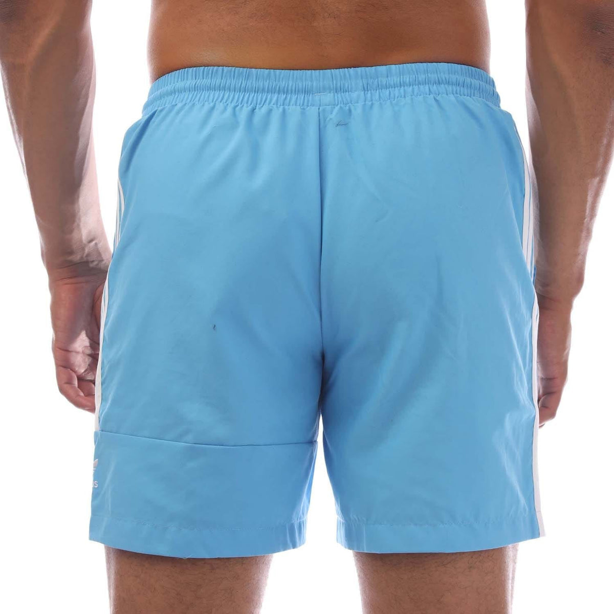 adidas Originals Lock Up swim shorts in black with logo detail, made for swimming and beach activities.