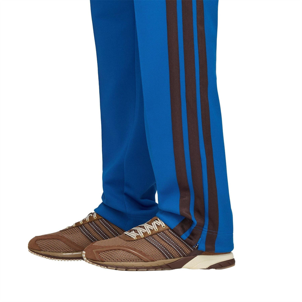 Men's blue track pants with dark side stripes and hem cuffs