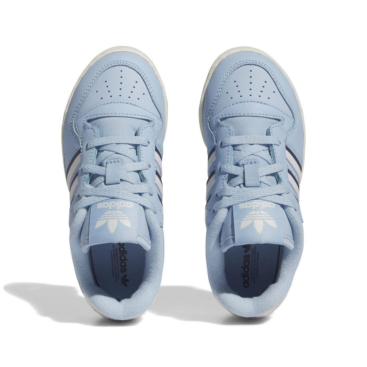 Pair of light blue low-top trainers, front view with lace-up and perforated toe