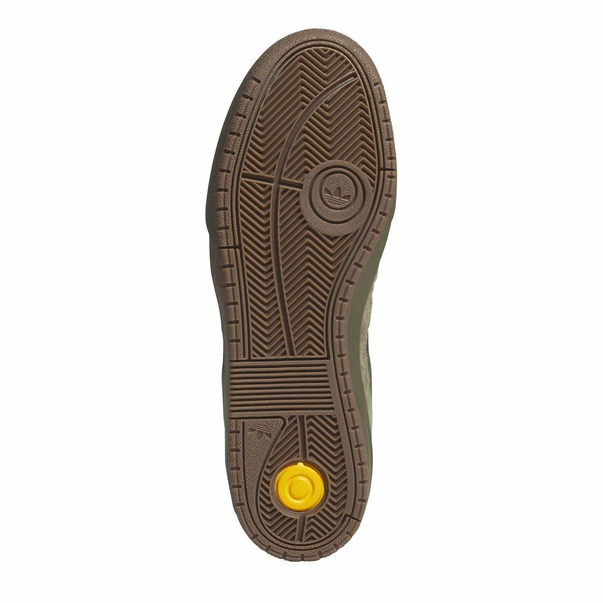 Adidas sneaker outsole, dark textured tread with yellow circular traction detail