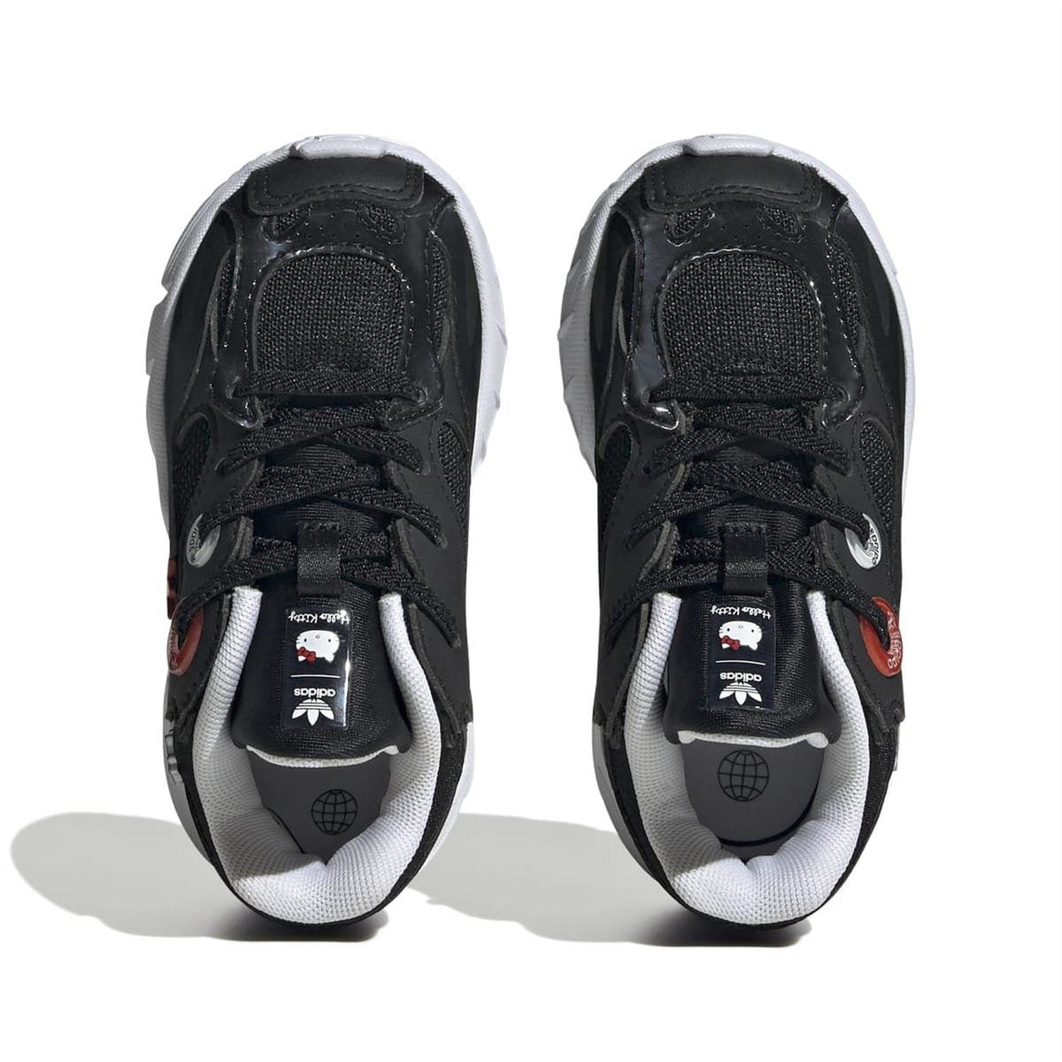 Black trainers interior view with black sockliner, lace eyelets, cushioned toe