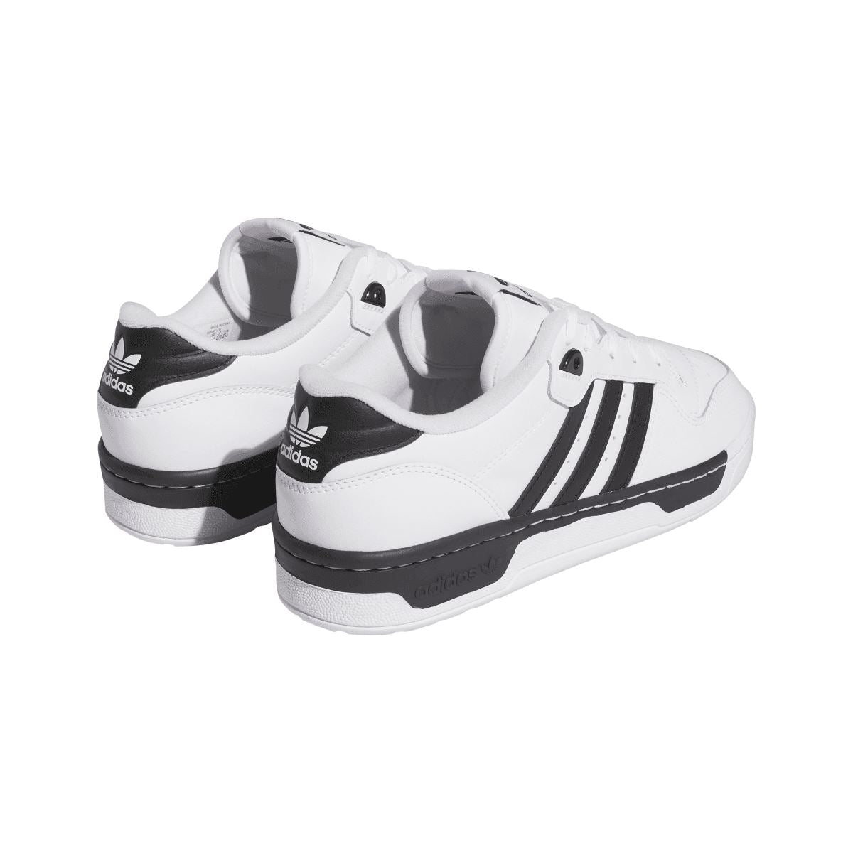 White low-top trainers back view with black heel panel and adidas logo