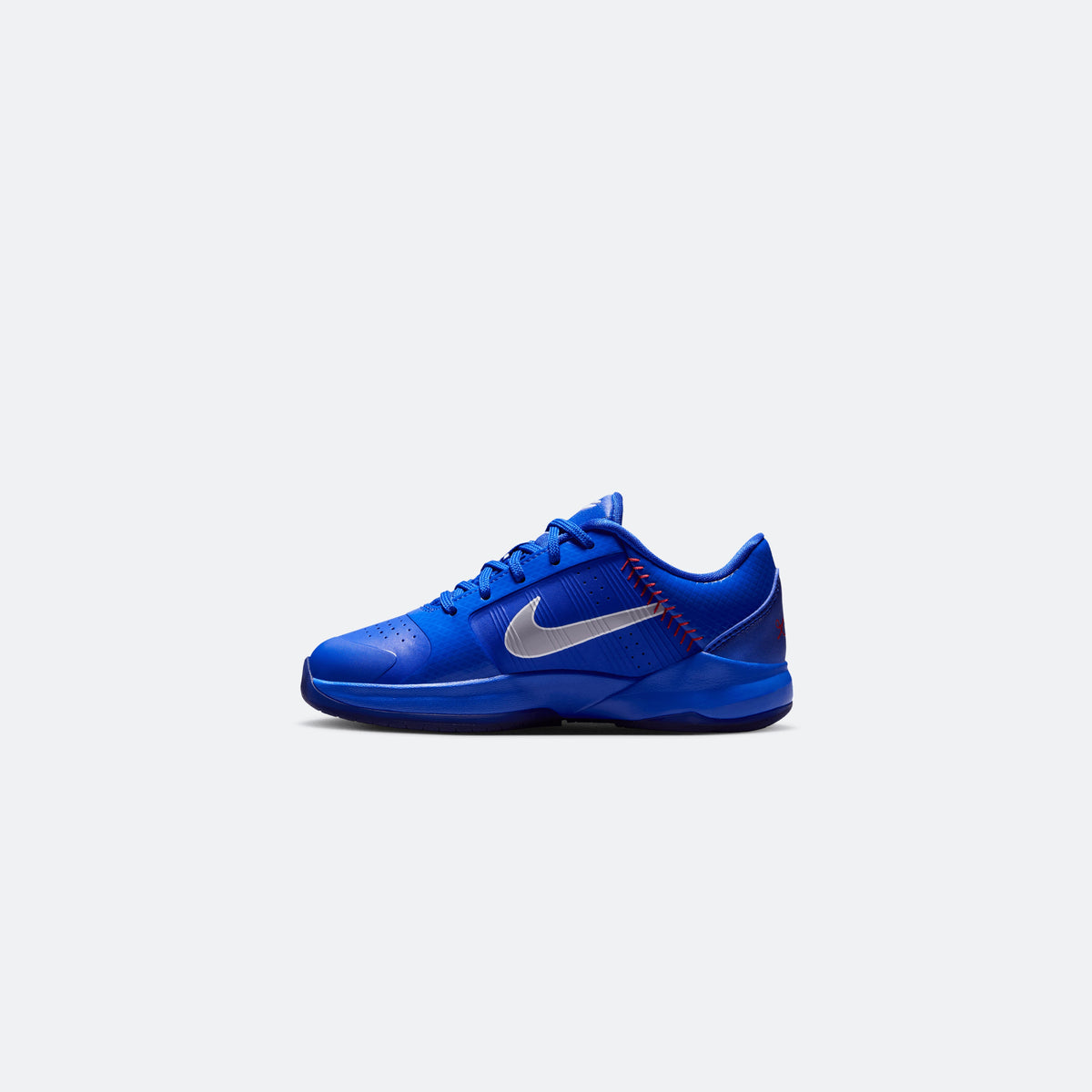 Blue Nike Kobe V low-top kids basketball shoe, side view with white Swoosh