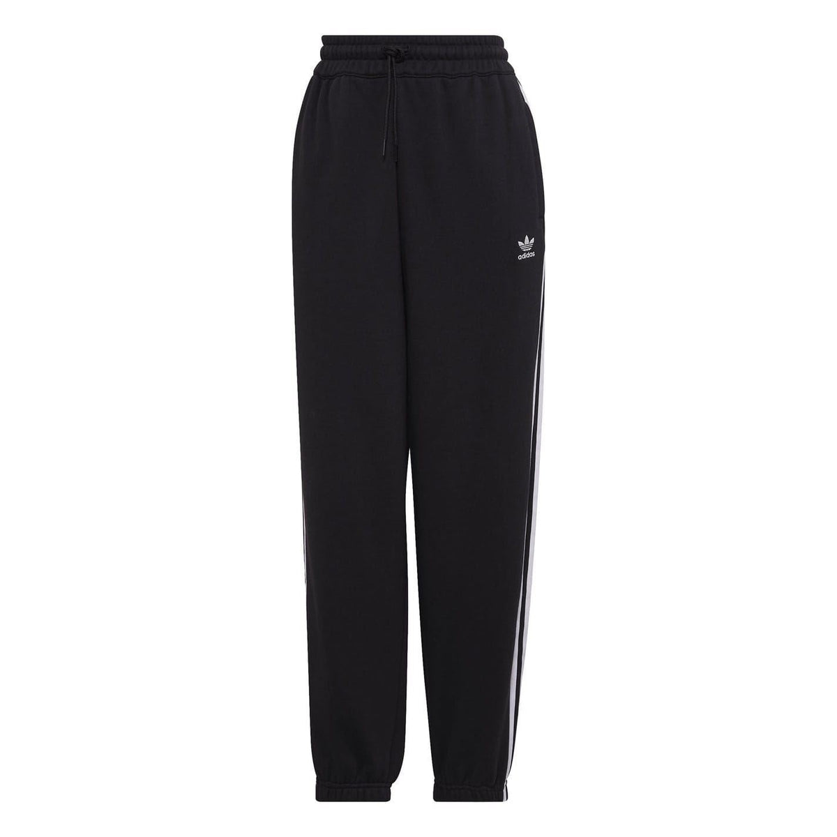 Black adidas Originals relaxed joggers, casual trousers with tapered fit and elastic waistband, worn styled with sneakers.