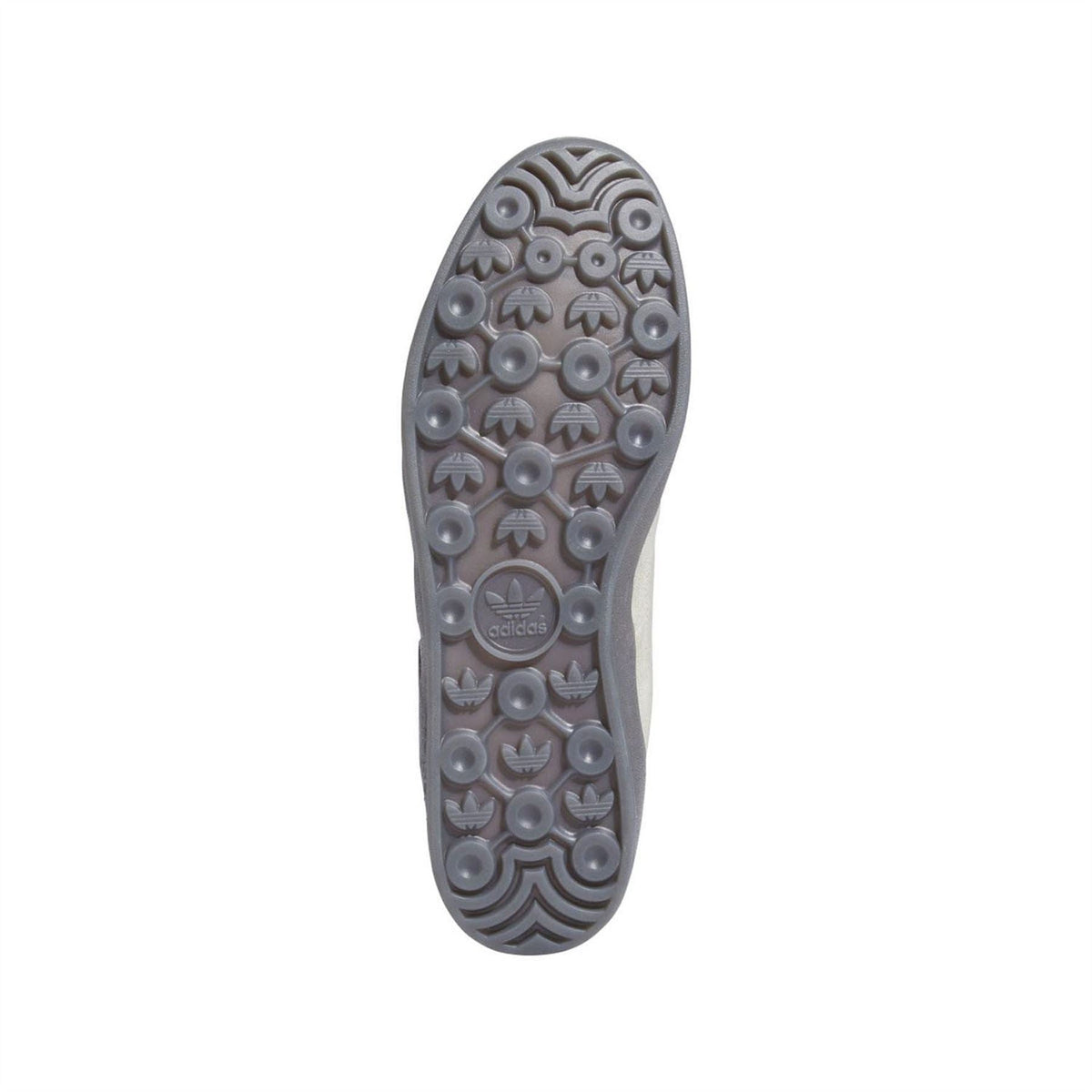 Beige adidas Originals Super Trainers outsole view with textured tread and logo