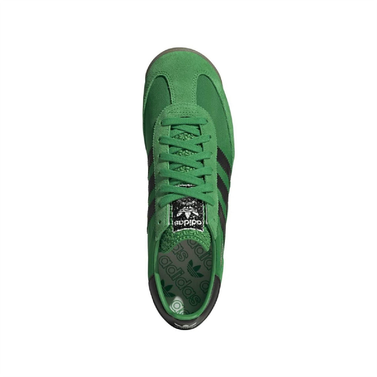 Green adidas trainers, top view with green laces and suede upper