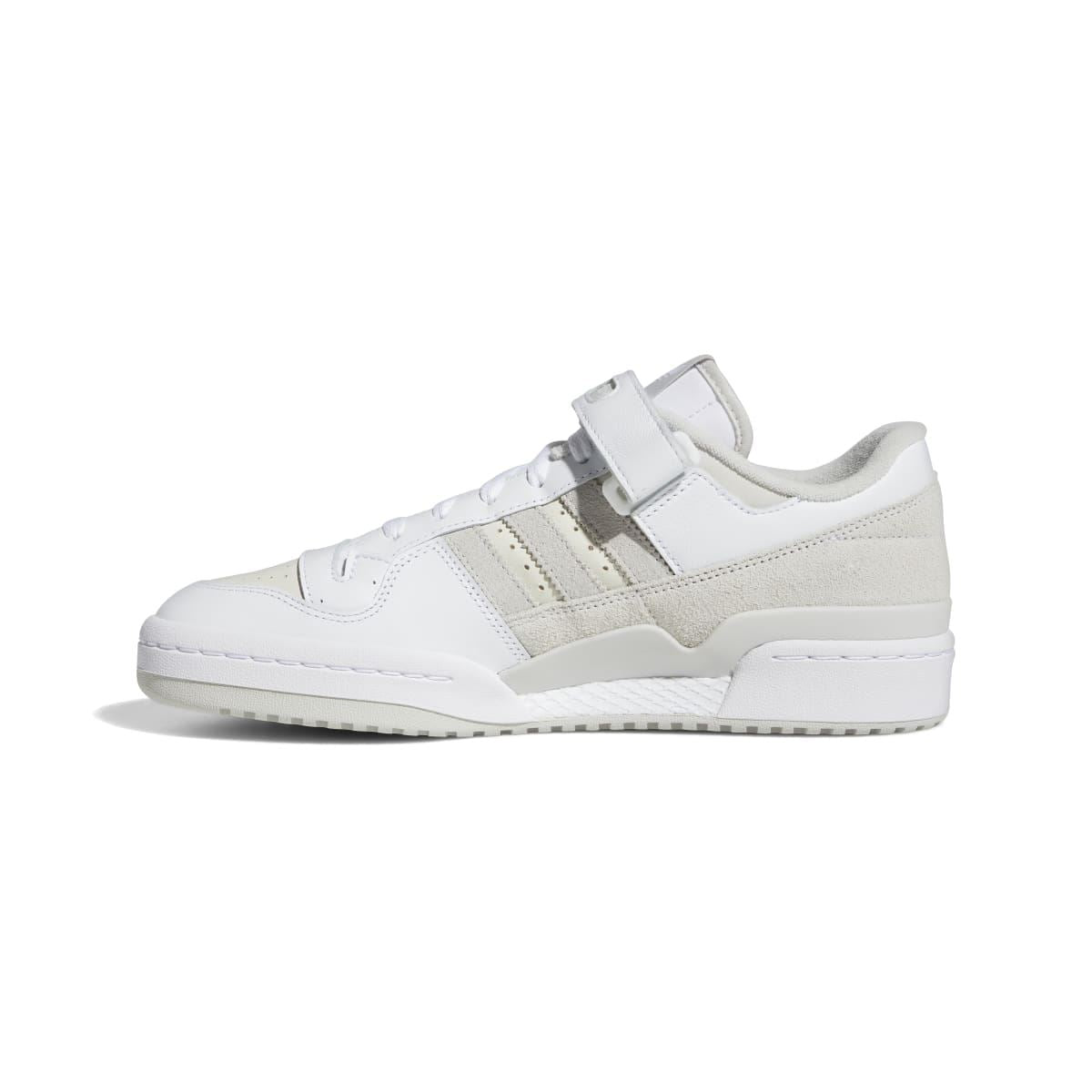 White and grey low-top trainers with adjustable strap and lace-up closure