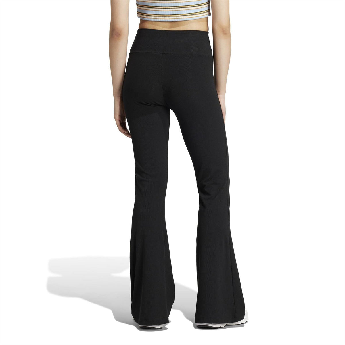 Black flared leggings, high-rise waistband, straight back view