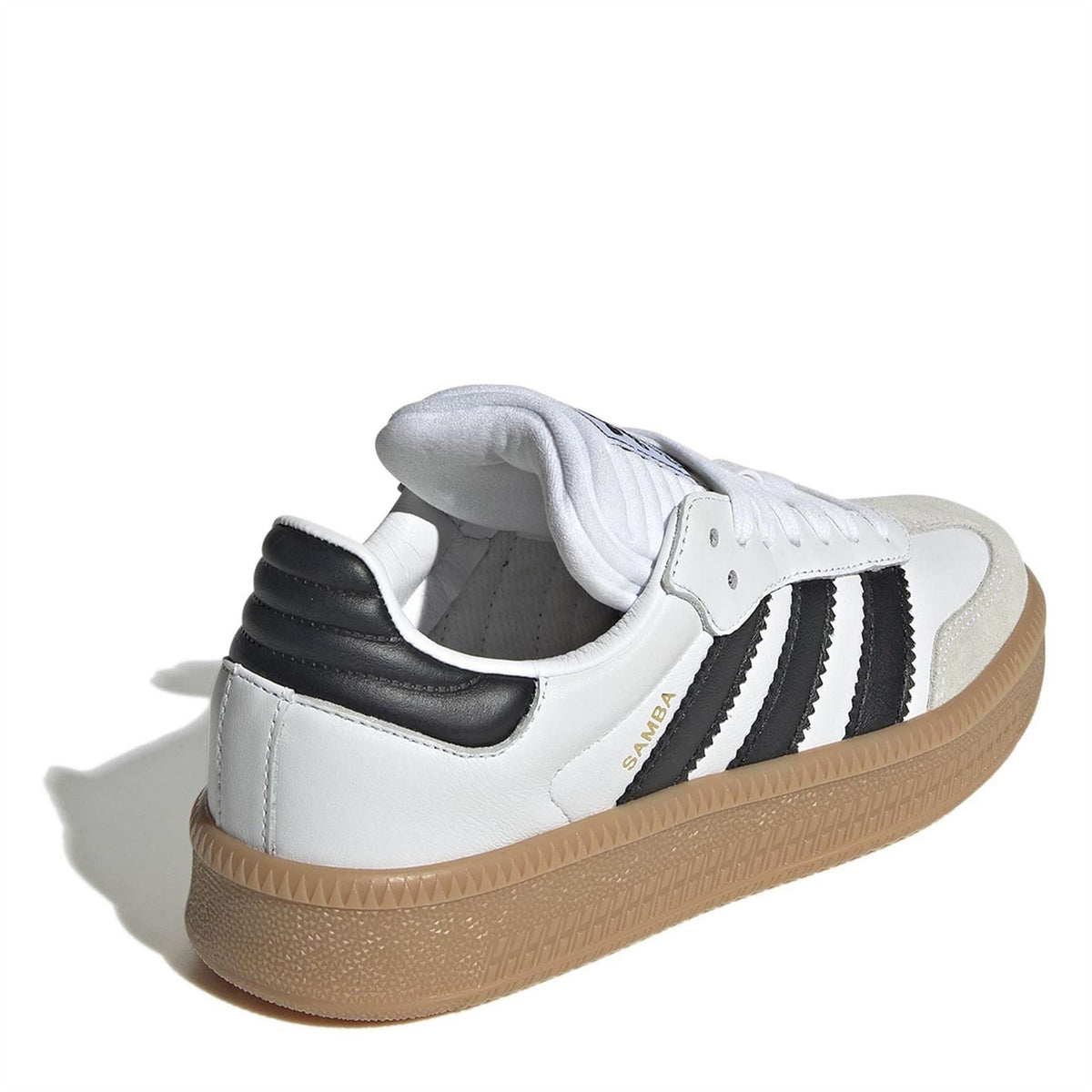 Kids white leather sneakers with black heel panel and gum rubber sole