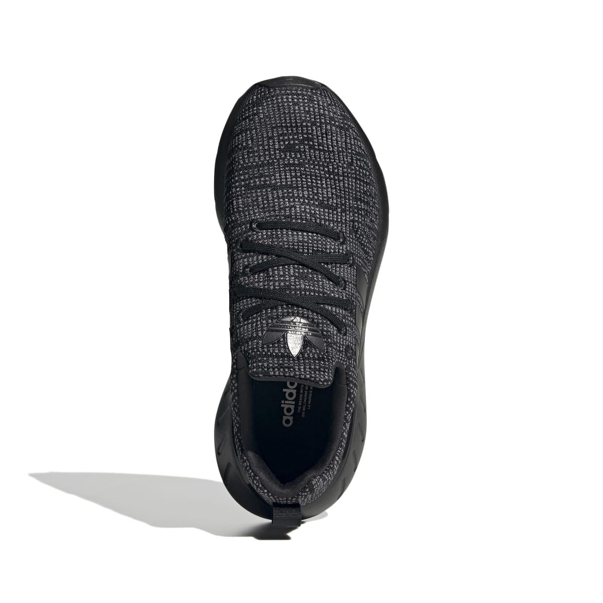 Kids' adidas trainers with dark speckled upper, padded collar, and lace closure