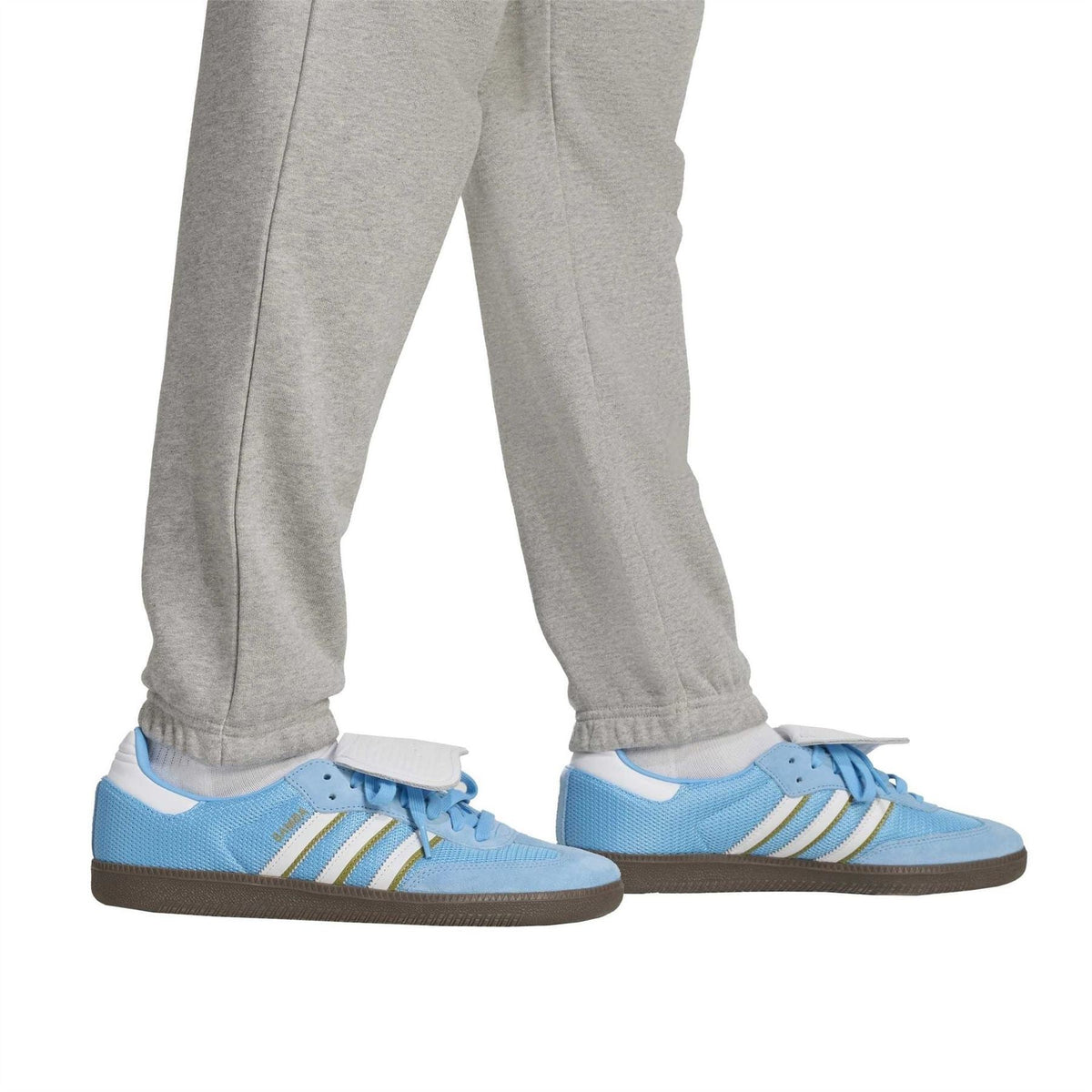 Heather grey jogger pants with elastic ankle cuffs and side seam stitching