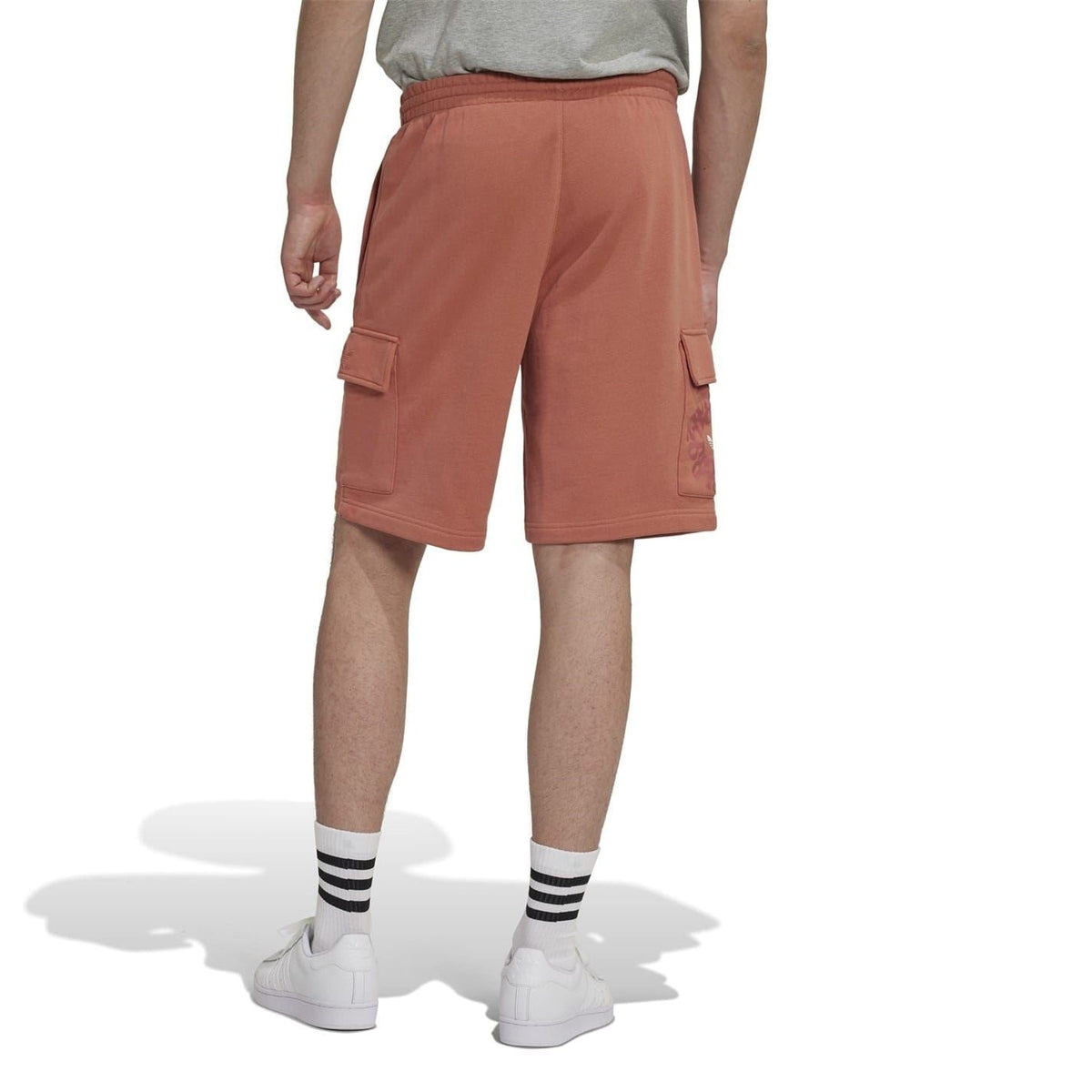Brown cargo shorts with belt-like loop, front pockets, drawstring waist