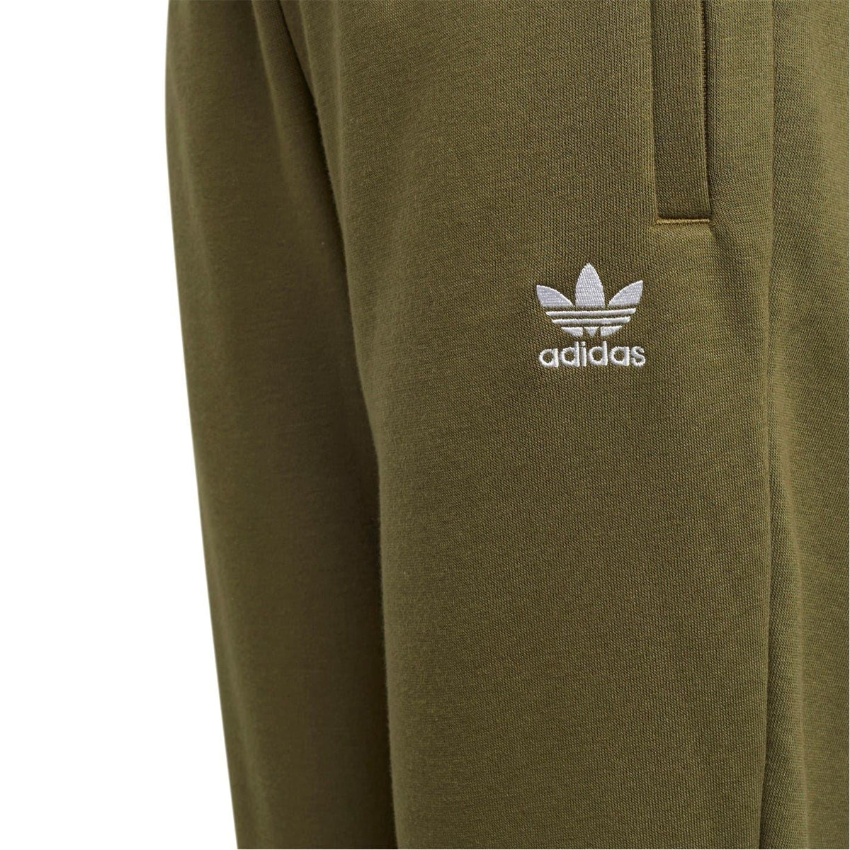 Olive joggers close-up with adidas logo on the right leg