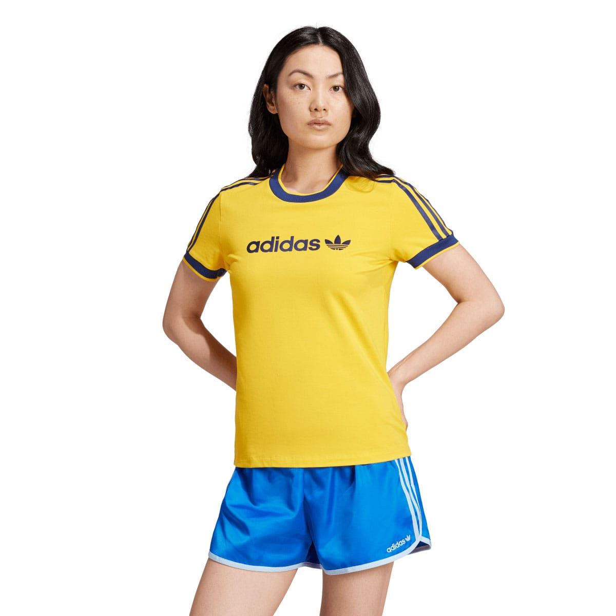 Yellow slim T-shirt with adidas badge logo and blue 3-stripe shoulder panels.