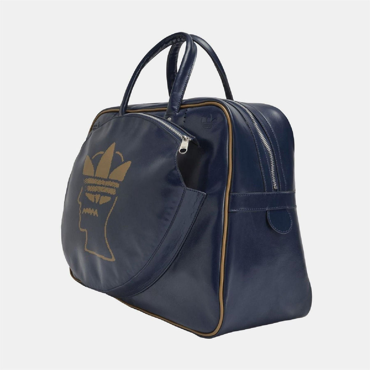 Navy duffel bag with rounded shape, top handles, and gold-trimmed zipper