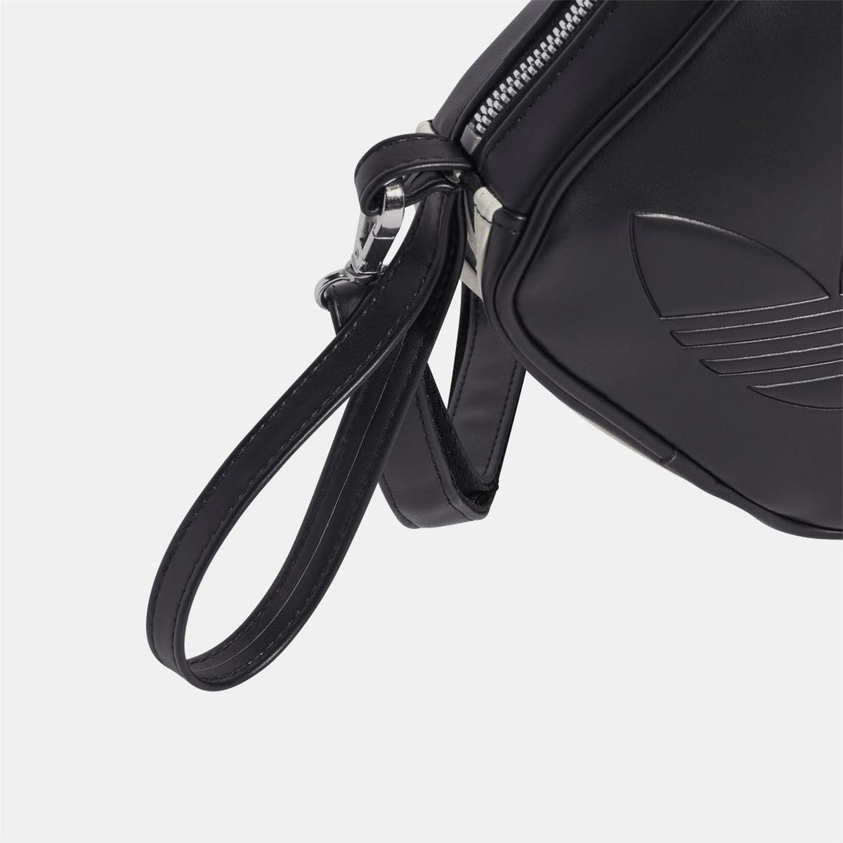 Men's adidas Originals shaped bag with adjustable strap and branded logo, featuring a sleek, modern design.