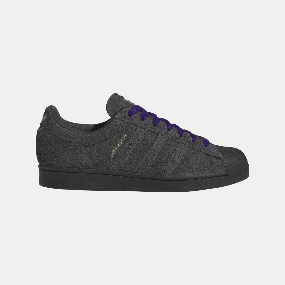 adidas Originals Superstar ADV shoes in white with classic rubber shell toe and textured sole, stylish footwear for casual wear