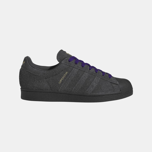 adidas Originals Superstar ADV shoes in white with classic rubber shell toe and textured sole, stylish footwear for casual wear