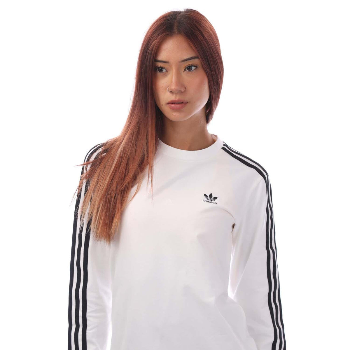 White adidas long-sleeve top with black side stripes and small chest trefoil logo