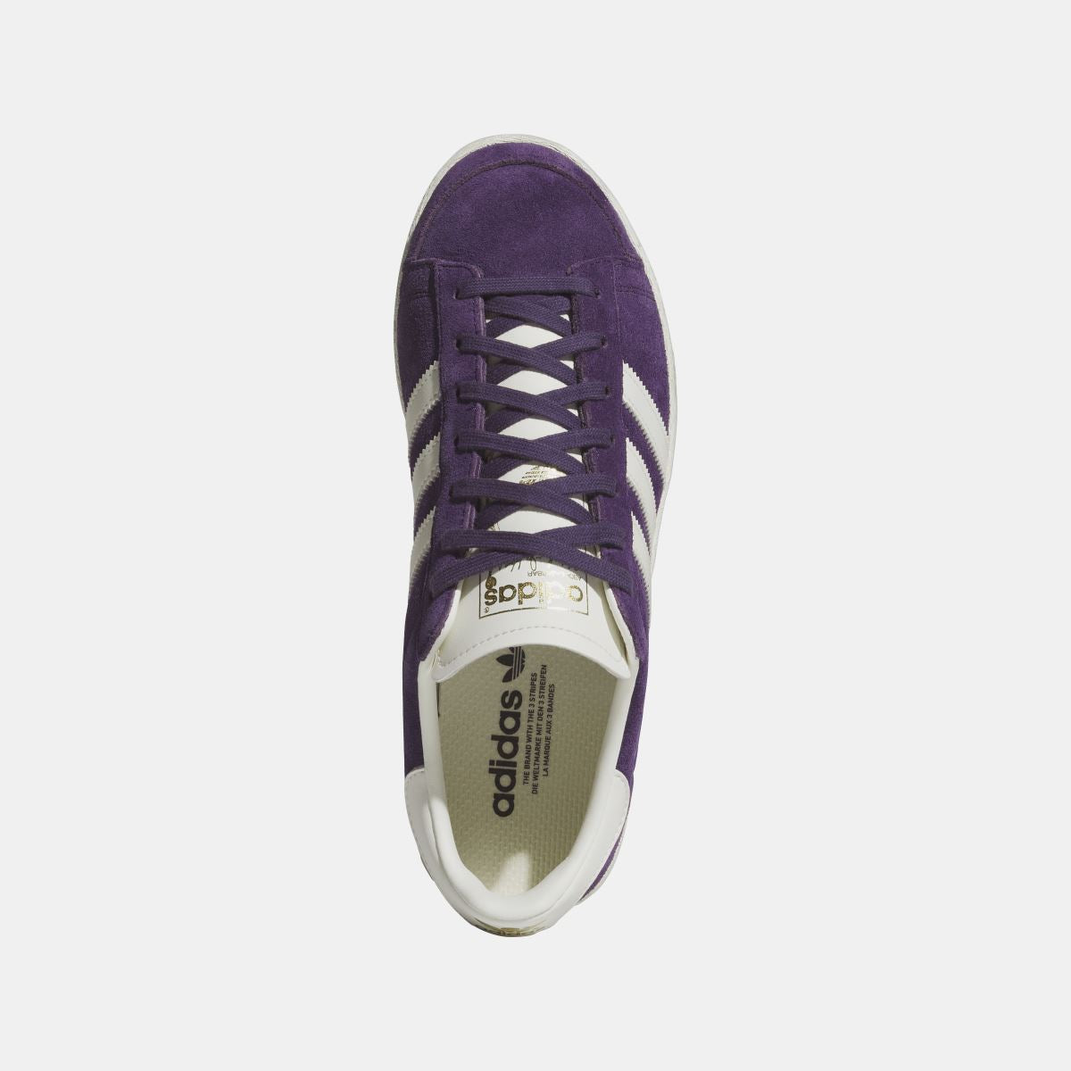 Purple adidas Originals Jabbar Lo sneaker front view with lace-up closure and white outsole