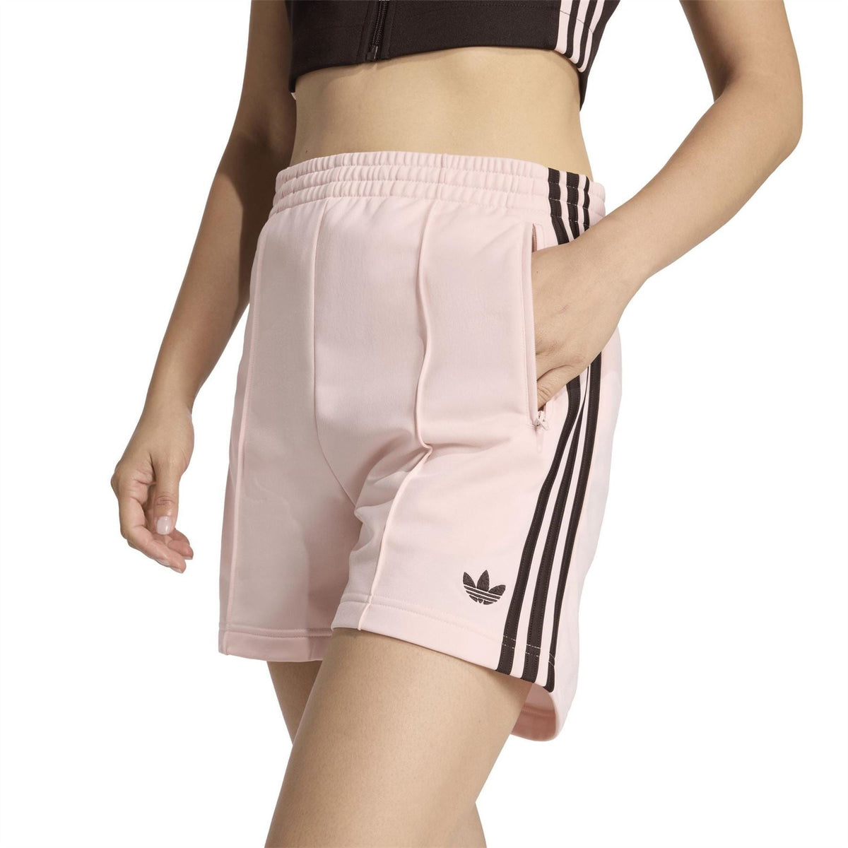 Light pink shorts with black side stripes and trefoil at hem; pull-on elastic waistband
