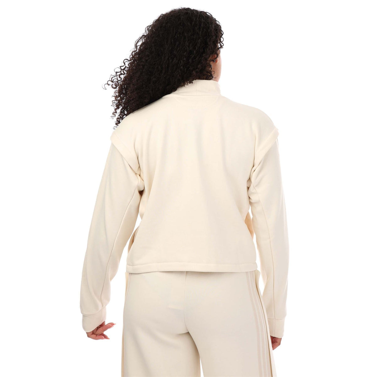 Cream crewneck sweatshirt back view with ribbed hem and long sleeves