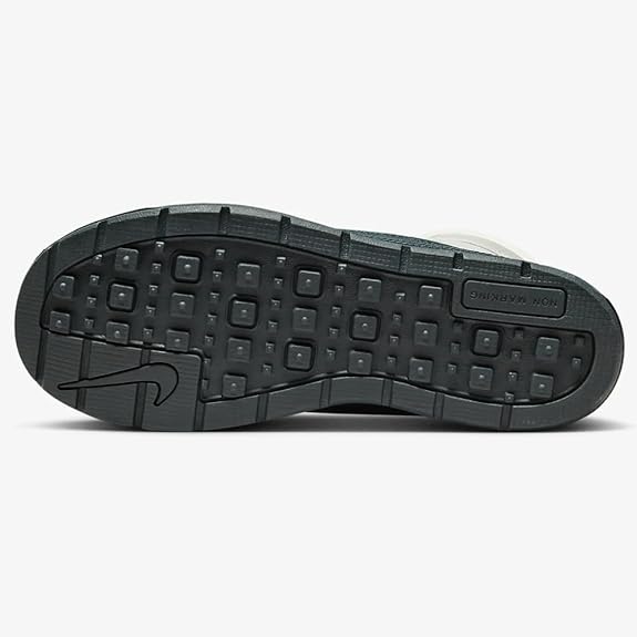 Kids high-top sneaker outsole with textured rubber tread, black base