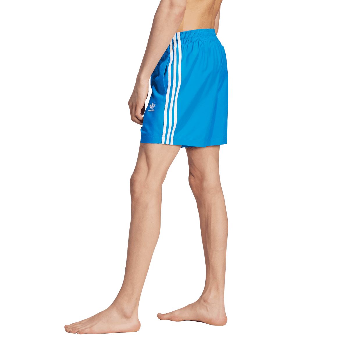 Blue adidas swim shorts with side stripes and logo at hem