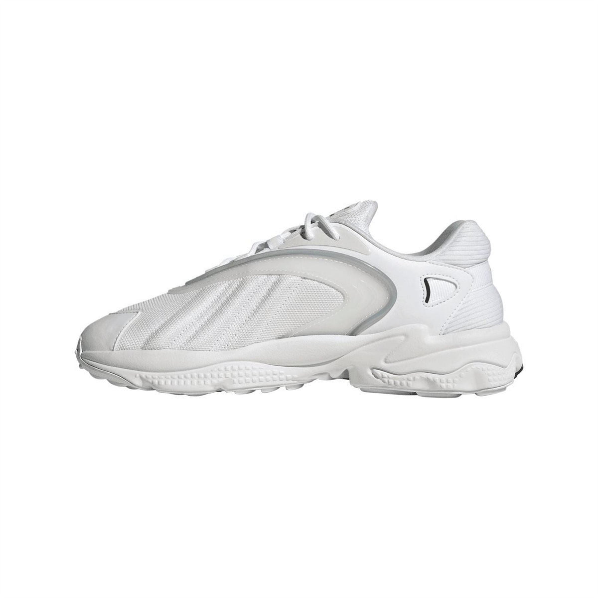 White adidas Originals trainers, side profile with molded overlays and lace-up