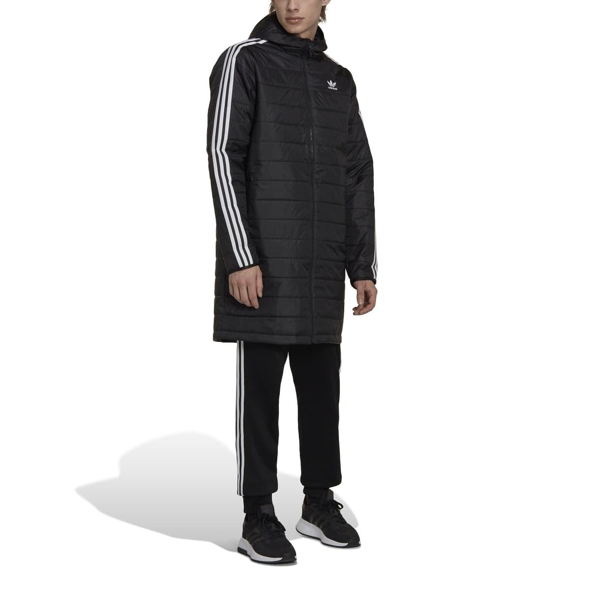 Black hooded padded coat with white 3-stripe sleeves and full-zip front; model side view.