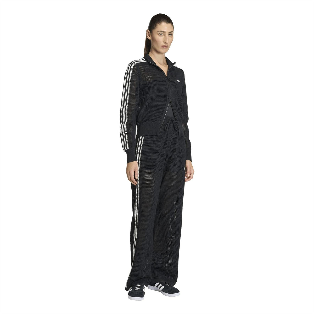 Black women's adidas-style jersey joggers with striped sides and open hems