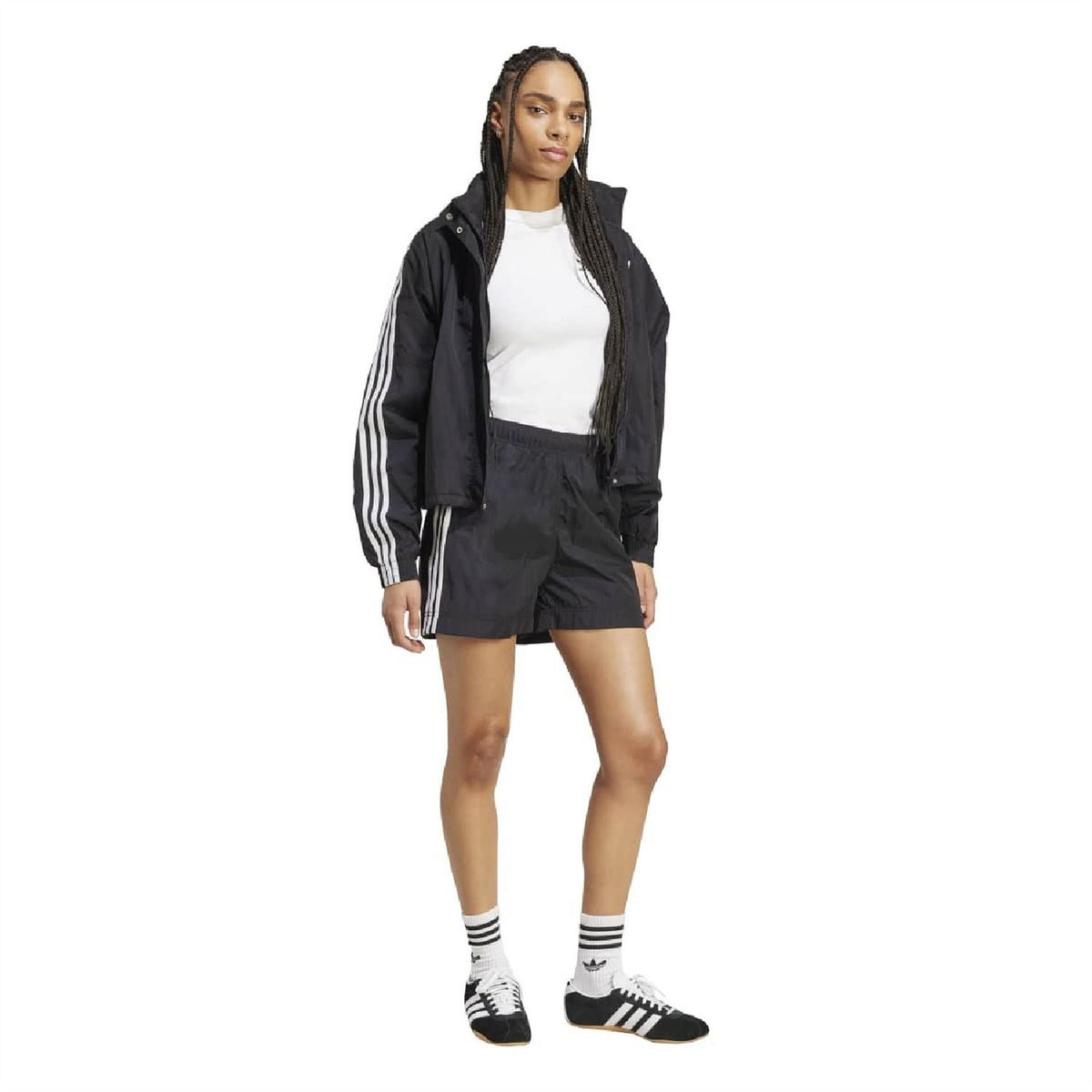 Black woven shorts with white side 3-Stripe tape, elastic waist, and logo.