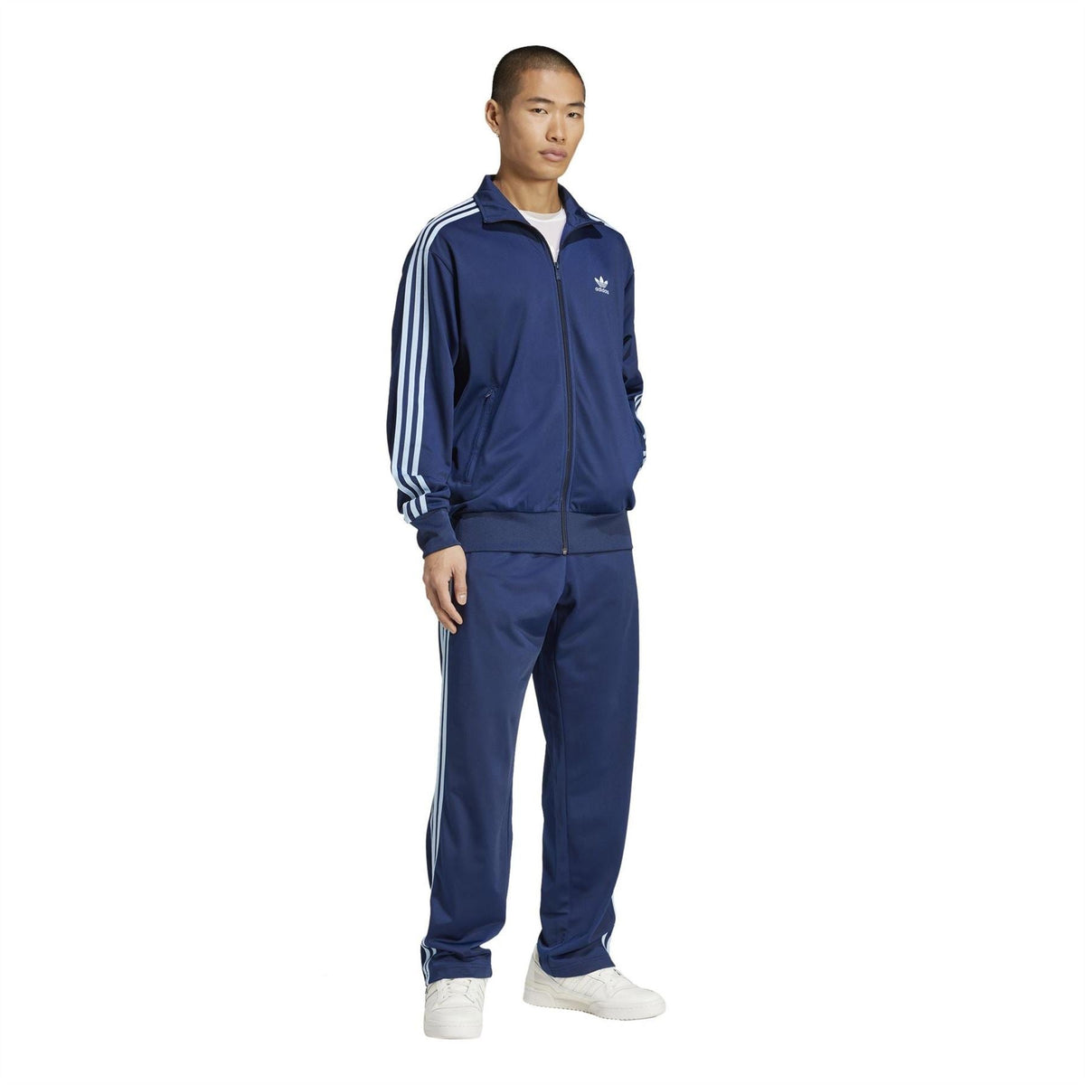 adidas Originals Firebird track jacket and pants in navy with white triple stripes