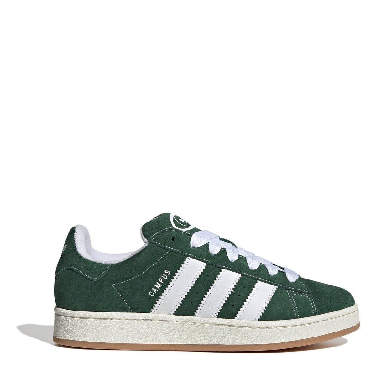 Dark green suede trainers with white adidas stripes and lace-up front, gum sole