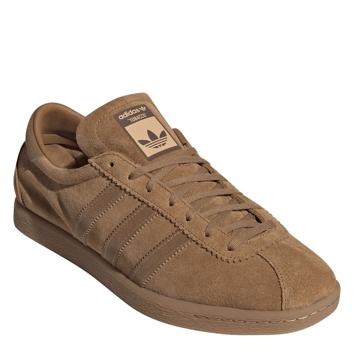 Adidas Originals brown low-top trainers with logo tongue tag and lace-up front