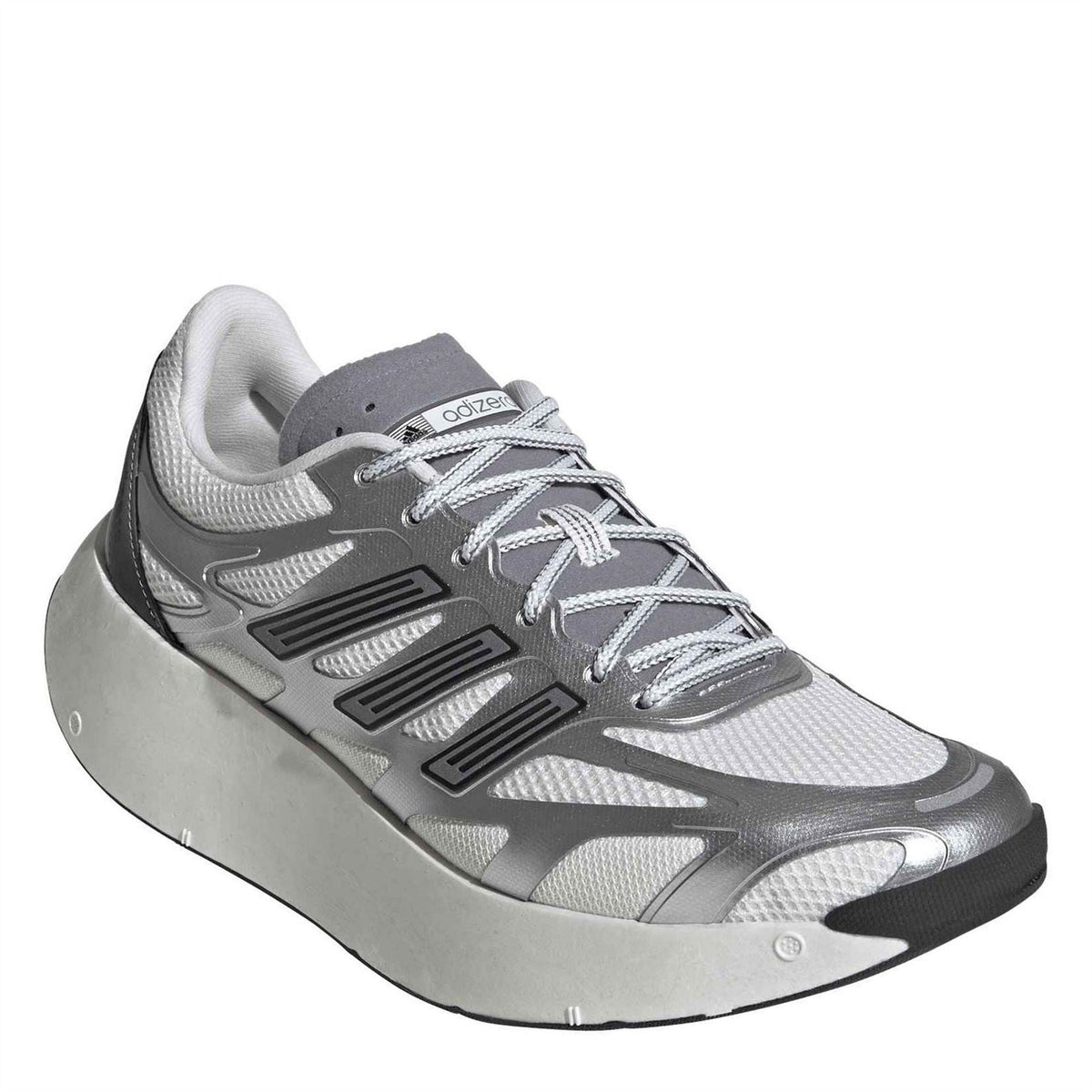 Silver and white lace-up running shoes with gray heel panel and chunky midsole