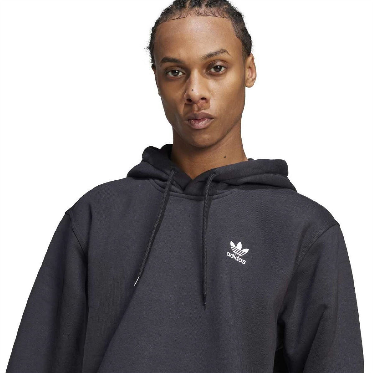 Black adidas Trefoil hoodie close-up, drawstring hood and chest logo