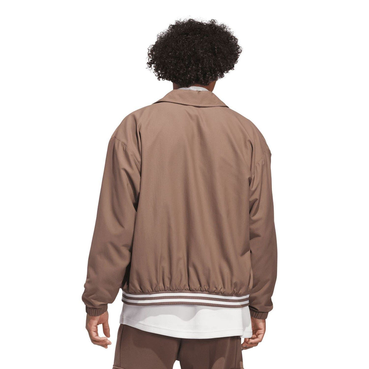 Brown coach overshirt back view with ribbed striped hem and cuffs