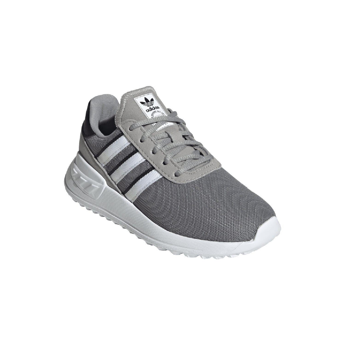 Grey kids sneaker with lace-up front and adidas tongue logo with white stripes