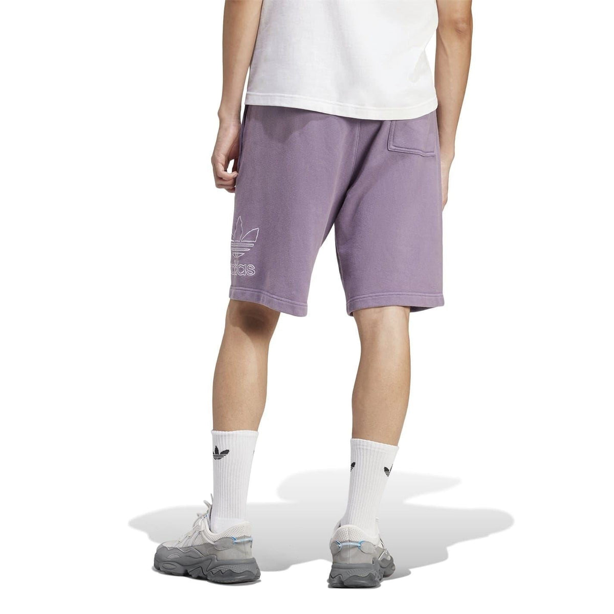 Purple adidas bermuda sweat shorts with trefoil outline logo on hem