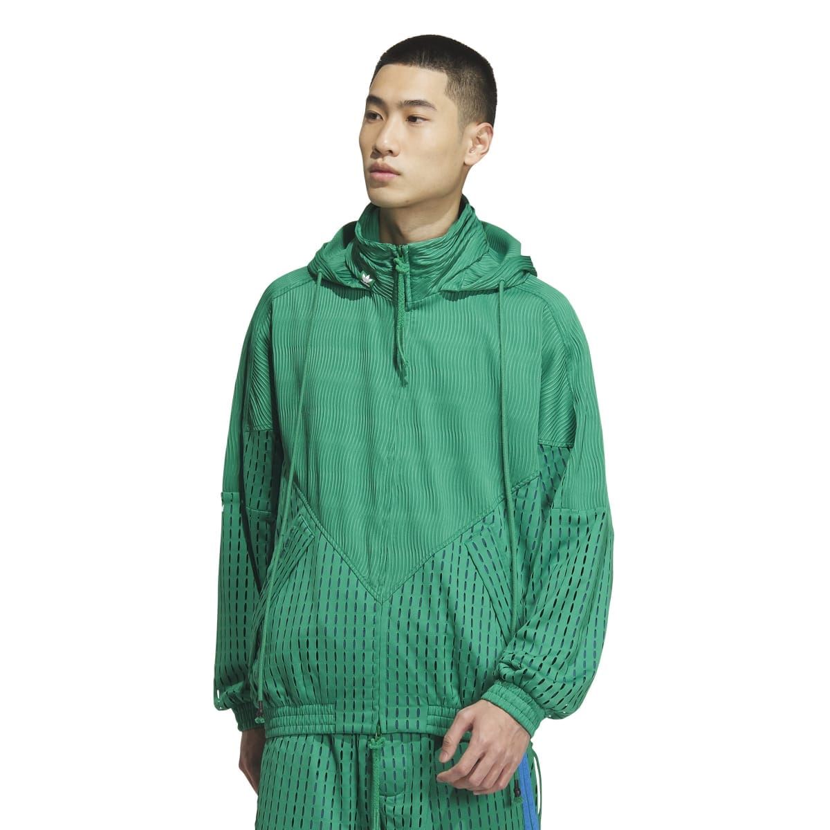 Green hooded zip jacket with striped knit texture and perforated panel detailing