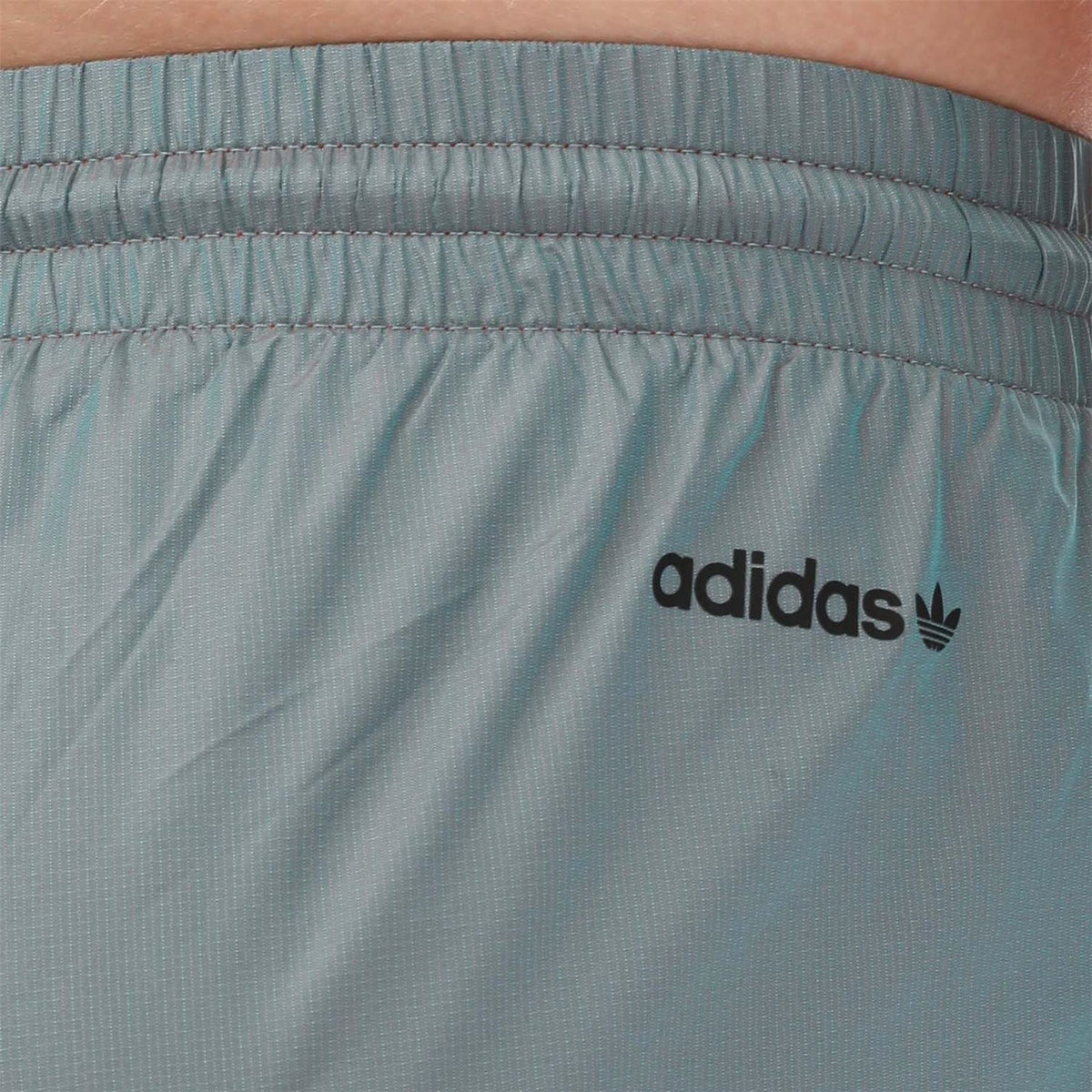 adidas Originals track pants waistband with elastic and adidas trefoil logo