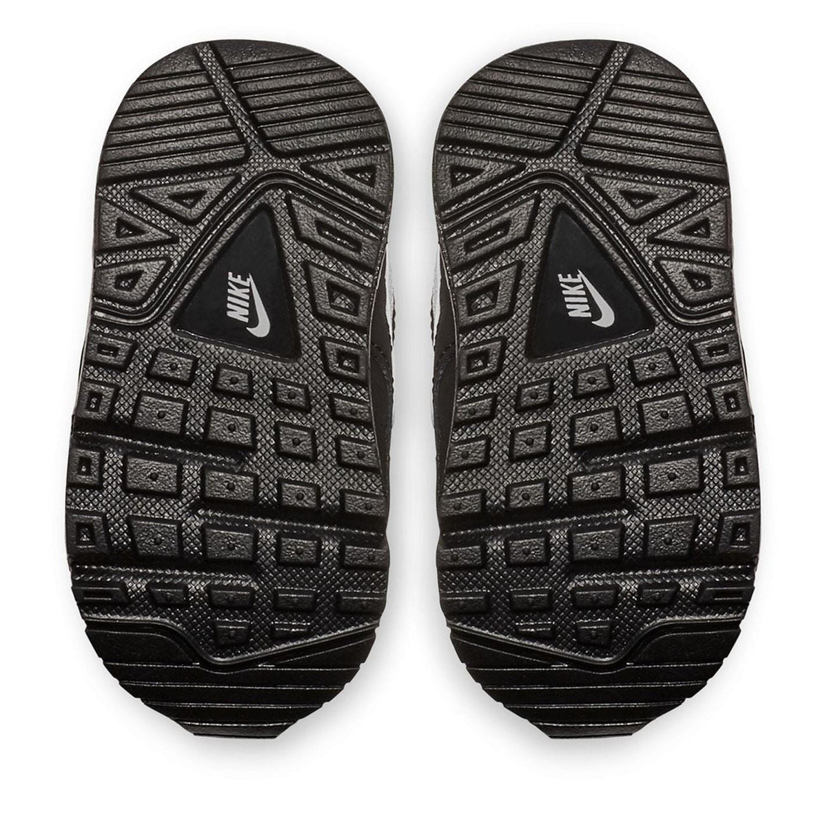 Pair of black infant shoe outsoles with patterned traction tread