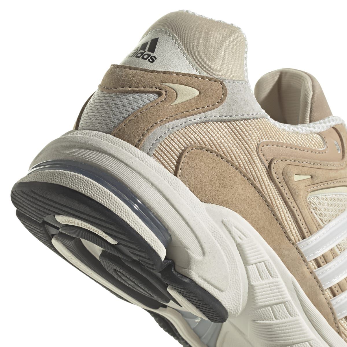 Sand and off-white heel and side view with contrast sole, cushioned collar, and side logo