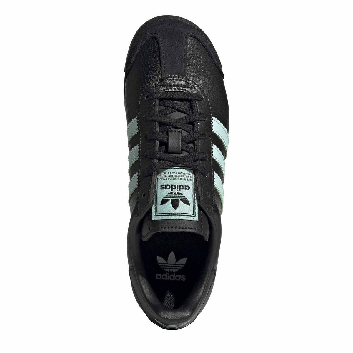 Front-view black low-top sneakers with laces and adidas Trefoil tongue patch