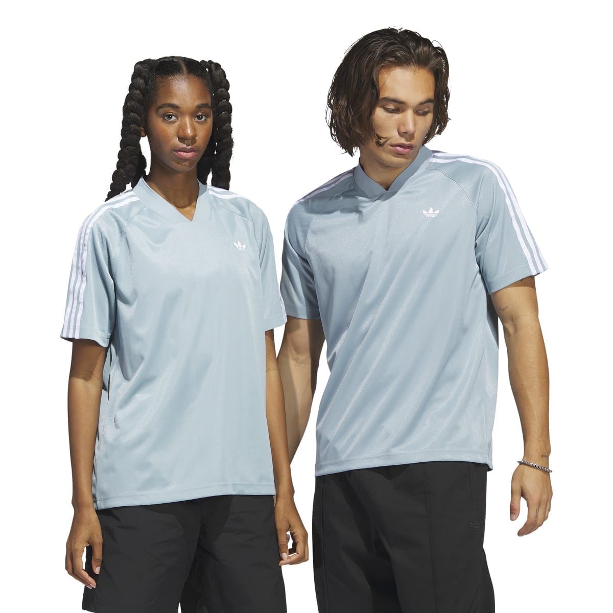 Pair of light blue jersey T-shirts with V-neck and trefoil logo on chest